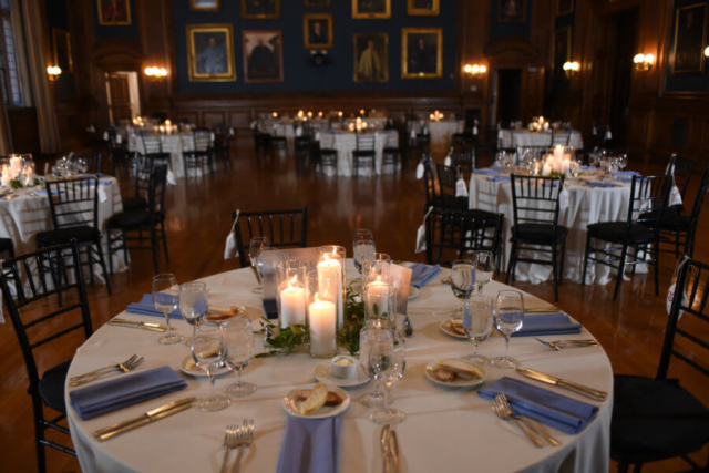 Mutter Museum in Philadelphia wedding reception.  Round tables with candle and greenery centerpieces
