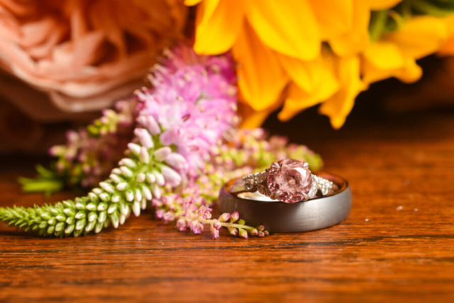 rings with wildflower bouquet.